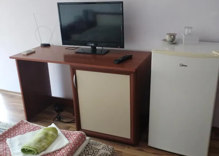 Πανσιόν ками *